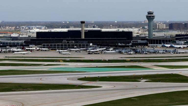 The O'Hare International Airport terminals are seen from the south air traffic control tower in Chicago, April 22, 2019. (AP Photo/Kiichiro Sato, File)
