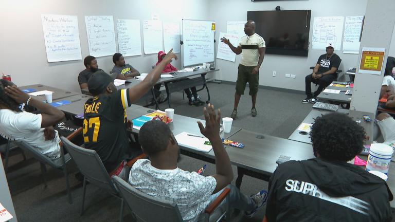 Chicago CRED hold a session for participants on July 6, 2023. (WTTW News)