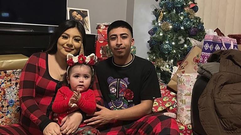 This undated family photo provided by Todd Pugh and Tania Dimitrova, Attorneys for the Alvarez family, shows Giselle Higuera, left, Anthony Alvarez, right, with their daughter in Chicago. (Courtesy Giselle Higuera and the Alvarez family via AP)
