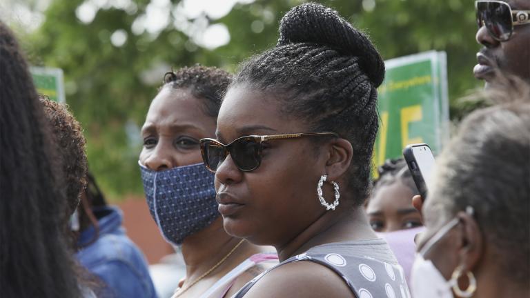 Mia Wright, center right, and is seen after speaking with reporters on June 4, 2020, in Chicago. A Chicago police officer accused of dragging Mia Wright from a car by her hair and kneeling on her back and neck during a period of protests and unrest following George Floyd's killing should be fired, the head of the police department told a civilian oversight board. (AP Photo / Teresa Crawford, File)