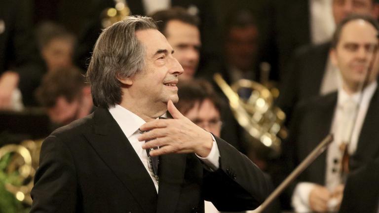 In this Jan. 1, 2018 file photo, Italian Maestro Riccardo Muti conducts the Vienna Philharmonic Orchestra during the traditional New Year’s concert at the golden hall of Vienna’s Musikverein, Austria. (AP Photo / Ronald Zak File)