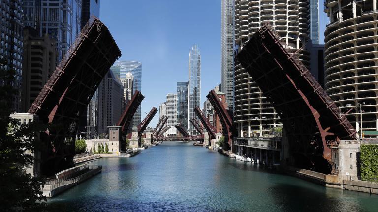 In this May 31, 2020 file photo, several street bridges over the Chicago River remain closed in Chicago, after a night of unrest and protests over the death of George Floyd, a Black man who was in police custody in Minneapolis. (AP Photo / Charles Rex Arbogast) In this May 31, 2020 file photo, several street bridges over the Chicago River remain closed in Chicago, after a night of unrest and protests over the death of George Floyd, a Black man who was in police custody in Minneapolis. (AP Photo / Charles Rex Arbogast)