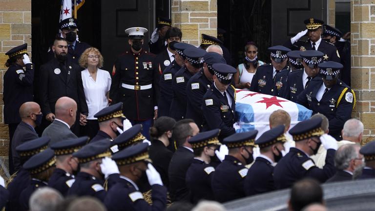 Elizabeth French, in white, and her son Andrew, left, follow the casket of her daughter, Chicago police officer Ella French, after a funeral service at the St. Rita of Cascia Shrine Chapel Thursday, Aug. 19, 2021, in Chicago. (AP Photo / Charles Rex Arbogast, File) Elizabeth French, in white, and her son Andrew, left, follow the casket of her daughter, Chicago police officer Ella French, after a funeral service at the St. Rita of Cascia Shrine Chapel Thursday, Aug. 19, 2021, in Chicago. (AP Photo / Charles Rex Arbogast, File)
