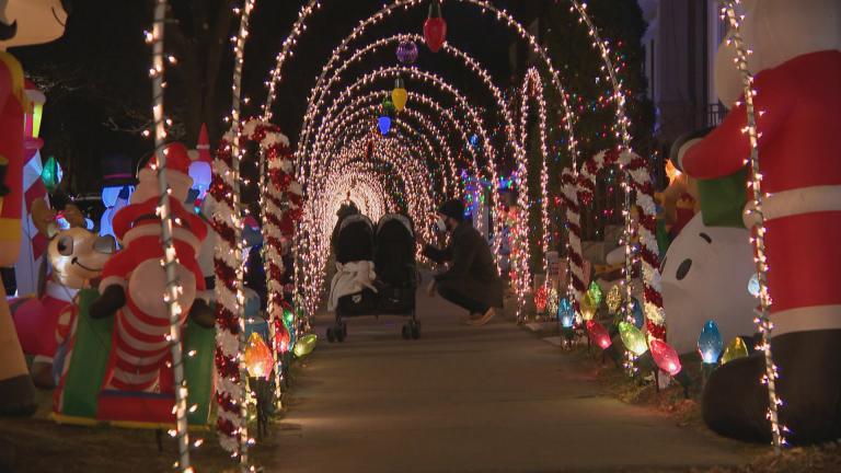 A holiday lights display on Francisco Avenue in Chicago. Public health officials urged residents across the state to avoid travel and large gatherings this holiday season to curb the spread of COVID-19. (WTTW News) A holiday lights display on Francisco Avenue in Chicago. Public health officials urged residents across the state to avoid travel and large gatherings this holiday season to curb the spread of COVID-19. (WTTW News)