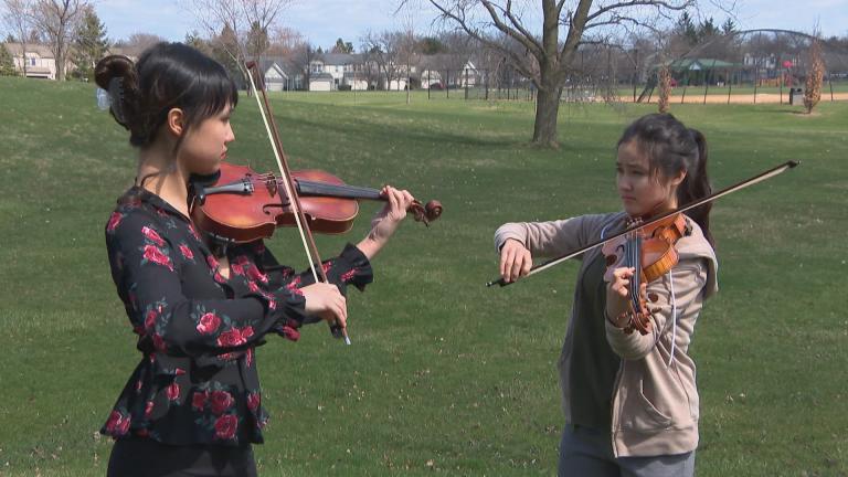 Sisters Claire, left, and Esme Arias-Kim (WTTW News)