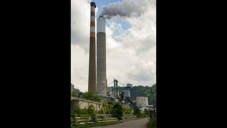 In this June 10, 2021 photo, a flume of emissions flow from a stack at the Cheswick Generating Station, a coal-fired power plant, in Springdale, Pa.  (AP Photo / Keith Srakocic, File)