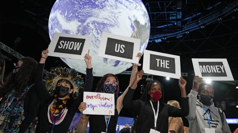 Climate activist Vanessa Nakate, second right, and other activists engage in a 'Show US The Money' protest at the COP26 U.N. Climate Summit in Glasgow, Scotland, Nov. 8, 2021. (AP Photo / Alastair Grant, File) 