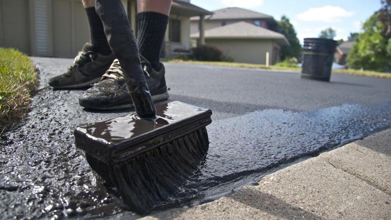 The Minnesota Legislature banned the sale and use of coal tar-based sealants on January 1, 2014. These products were commonly applied to asphalt driveways and parking lots. (MPCA Photos / Flickr)