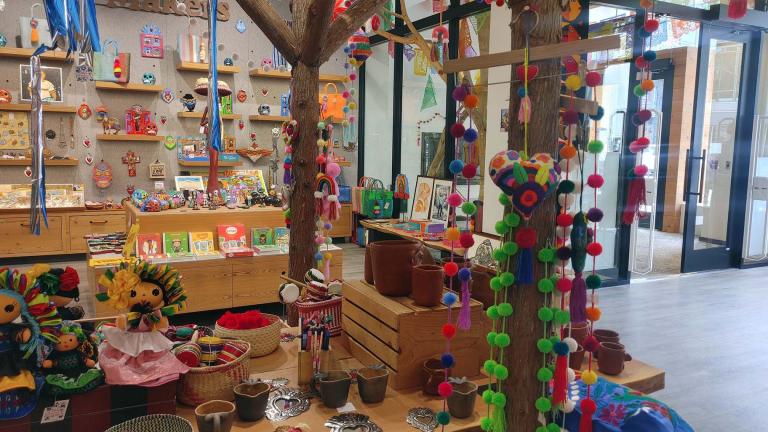 Shoppers stepping inside this Michigan Avenue store are swiftly transported from busy urban streets into a vibrant Mexican street market bursting with handcrafted goods. (WTTW News / Erica Gunderson) Shoppers stepping inside this Michigan Avenue store are swiftly transported from busy urban streets into a vibrant Mexican street market bursting with handcrafted goods. (WTTW News / Erica Gunderson)