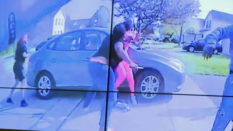 In an image from police body camera video that the Columbus Police Department played during a news conference Tuesday night, April 20, 2021, a teenage girl, foreground, appears to wield a knife during an altercation before being shot by a police officer Tuesday, April 20, 2021, in Columbus, Ohio. (Columbus Police Department via WSYX-TV via AP)
