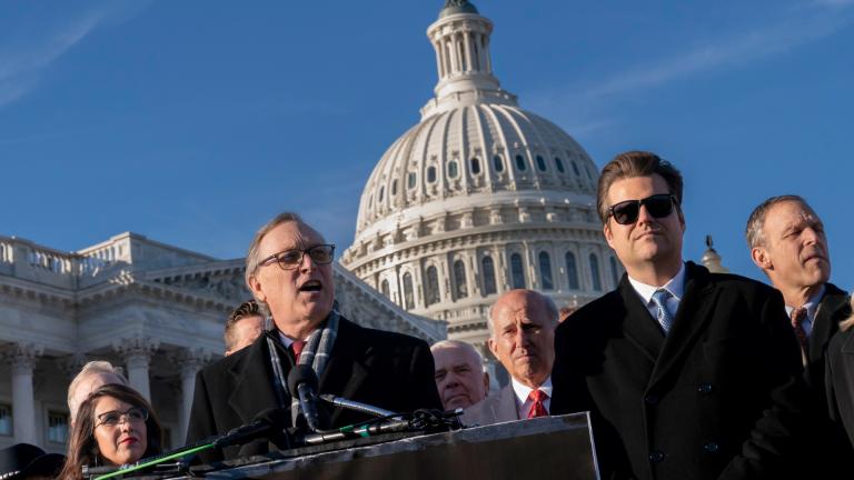 Rep. Andy Biggs, R-Ariz., and members of the conservative House Freedom Caucus, from left, Rep. Lauren Boebert, R-Colo., Rep. Louie Gohmert, R-Texas, Rep. Matt Gaetz, R-Fla., and Rep. Scott Perry, R-Pa., talk to reporters at the Capitol in Washington, Dec. 13, 2022. (AP Photo / J. Scott Applewhite, File)