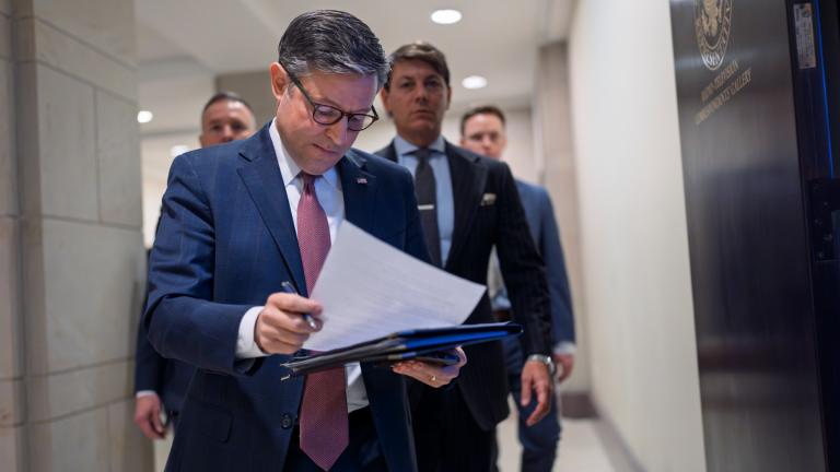 Speaker of the House Mike Johnson, R-La., arrives to talk to reporters after a closed-door meeting with fellow Republicans to find agreement on a spending bill, at the Capitol in Washington, Tuesday, Feb. 11, 2025. (AP Photo / J. Scott Applewhite)