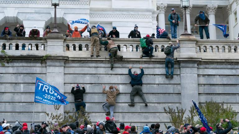 Supporters of President Donald Trump climb the west wall of the the U.S. Capitol in Washington, Jan. 6, 2021. (AP Photo / Jose Luis Magana, File)