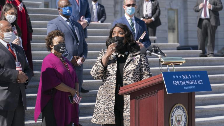 Rep. Terri Sewell, D-Ala., recalls the work of the late Rep. John Lewis as Democrats gather to address reporters on H.R. 1, the For the People Act of 2021, at the Capitol in Washington, Wednesday, March 3, 2021. (AP Photo/J. Scott Applewhite)