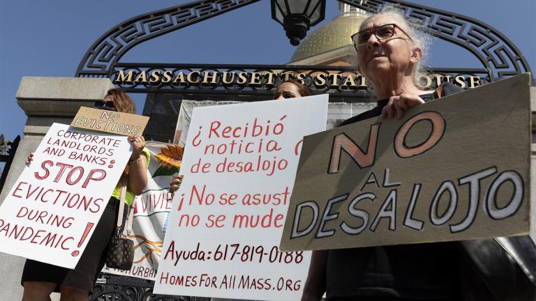 People from a coalition of housing justice groups hold signs protesting evictions during a news conference outside the Statehouse, Friday, July 30, 2021, in Boston. (AP Photo / Michael Dwyer) People from a coalition of housing justice groups hold signs protesting evictions during a news conference outside the Statehouse, Friday, July 30, 2021, in Boston. (AP Photo / Michael Dwyer)