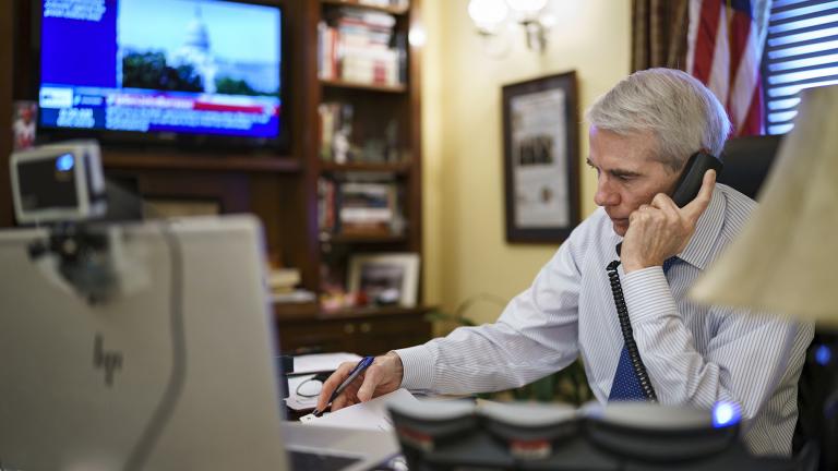 Sen. Rob Portman, R-Ohio, the top Republican negotiator on the bipartisan infrastructure bill, works from his office on Capitol Hill as he continues to shepherd the $1 trillion legislation closer to passage, in Washington, Monday, Aug. 9, 2021. (AP Photo / J. Scott Applewhite)