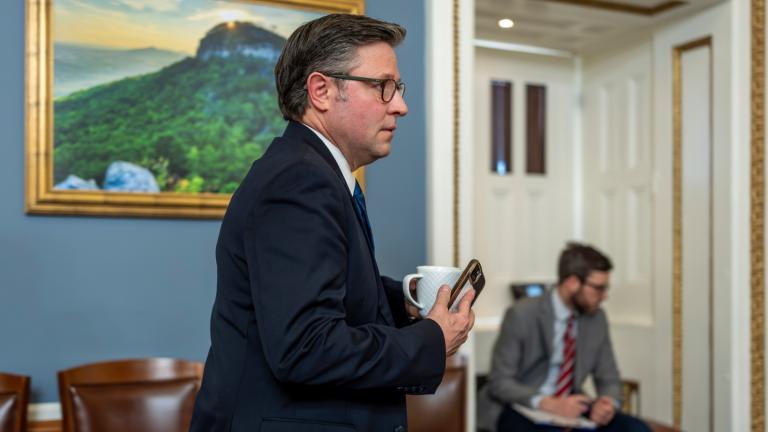 Speaker of the House Mike Johnson, R-La., walks through the House Rules Committee hearing room to meet with Republicans on the panel as they try to advance a federal funding package and prevent a prolonged partial government shutdown, at the Capitol in Washington, Monday, Feb. 2, 2026. (AP Photo / J. Scott Applewhite)