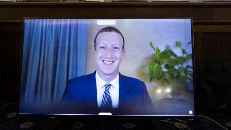 Facebook CEO Mark Zuckerberg appears on a screen as he speaks remotely during a hearing before the Senate Commerce Committee on Capitol Hill, Wednesday, Oct. 28, 2020, in Washington. (Michael Reynolds / Pool via AP)