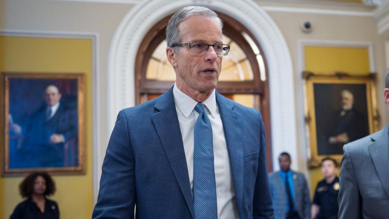 Senate Majority Leader John Thune, R-S.D., rushes from the chamber to his office as he struggles with Republicans opposed to President Donald Trump's signature bill of big tax breaks and spending cuts, at the Capitol in Washington, Tuesday, July 1, 2025. (AP Photo / J. Scott Applewhite)