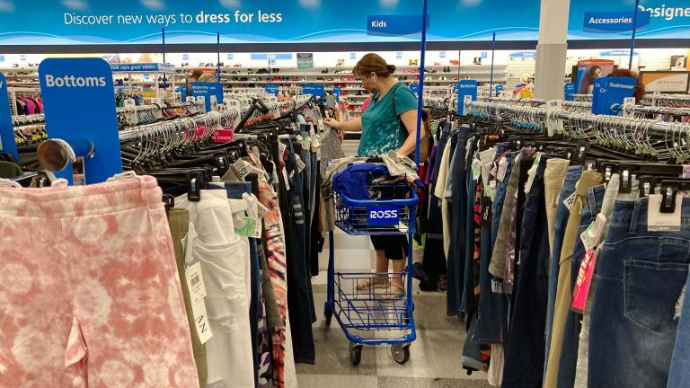 In this July 21, 2021 photo, a consumer shops at a retail store in Morton Grove, Ill. (AP Photo / Nam Y. Huh)