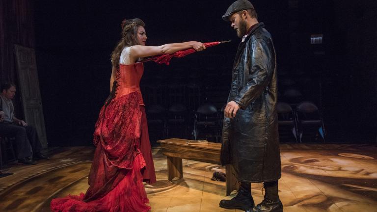 Ilse Zacharias (left) and Drew Schad in Shattered Globe Theatre’s new adaptation of “Crime and Punishment.” (Photo by Michael Brosilow)