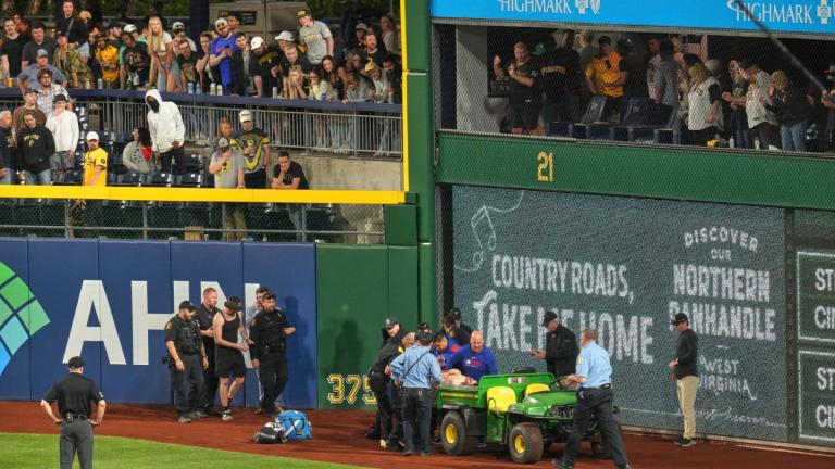 A fan is carted off the field at PNC Park after falling out of the stands during the seventh inning of a baseball game between the Pittsburgh Pirates and the Chicago Cubs in Pittsburgh, Wednesday, April 30, 2025. (AP Photo / Gene J. Puskar)