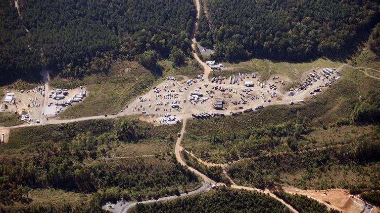 In this Sept. 20, 2016 file photo vehicles are seen near Colonial Pipeline in Helena, Ala. (AP Photo / Brynn Anderson, File)