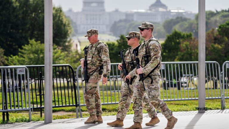 National Guard troops patrol the grounds of the Washington Monument with the Capitol seen in the distance as part of President Donald Trump's order to impose federal law enforcement in the nation's capital, in Washington, Thursday, Aug. 28, 2025. (AP Photo / J. Scott Applewhite)