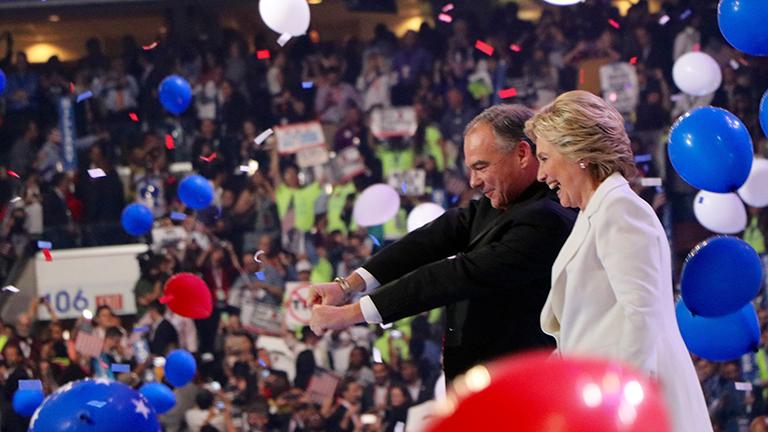 Hillary Clinton and her running mate Tim Kaine greet the crowd after her speech. (Evan Garcia / Chicago Tonight)