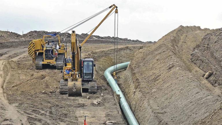 In this Oct. 5, 2016, file photo, heavy equipment is seen at a site where sections of the Dakota Access pipeline were being buried near the town of St. Anthony in Morton County, N.D. (Tom Stromme / The Bismarck Tribune via AP, File)