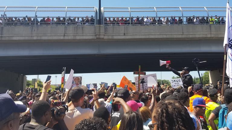 Protesters on the Dan Ryan Expressway on July 7, 2018. (Matt Masterson / Chicago Tonight)