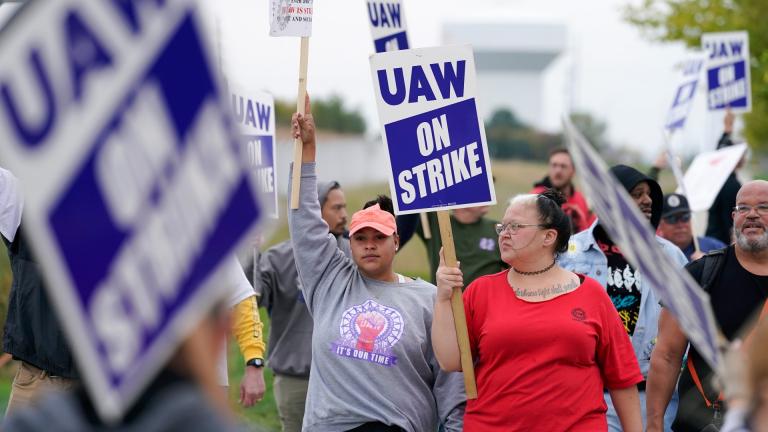Members of the United Auto Workers strike outside of a John Deere plant, Wednesday, Oct. 20, 2021, in Ankeny, Iowa. (AP Photo / Charlie Neibergall)