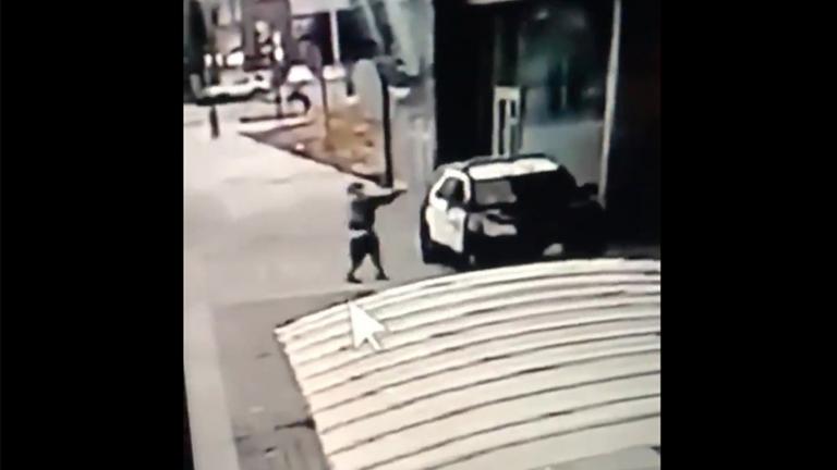 A screen grab from a security camera video released the Los Angeles County Sheriff’s Department shows a gunman walking up to sheriff’s deputies and opening fire without warning or provocation in Compton, Calif., on Saturday, Sept. 12, 2020. (Los Angeles County Sheriff’s Department via AP)