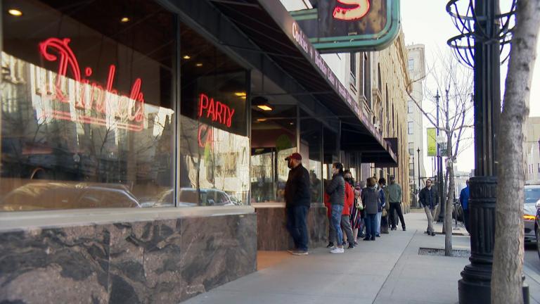 By the looks of the lines at Dinkel’s, lots of customers are going to miss the sweetness of the bakery. (WTTW News)