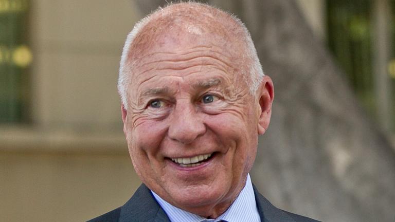 Attorney Tom Girardi smiles outside the Los Angeles courthouse on Wednesday, July 9, 2014. (AP Photo / Damian Dovarganes, File)