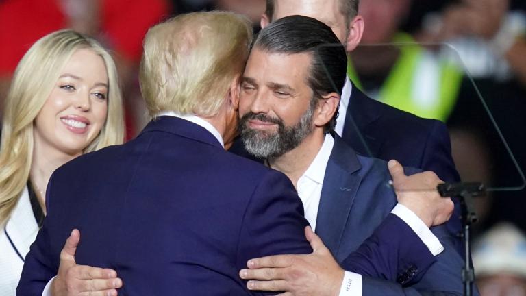 Republican presidential nominee former President Donald Trump hugs Donald Trump Jr., at a campaign rally at PPG Paints Arena, Nov. 4, 2024, in Pittsburgh. (AP Photo / Matt Freed, File)