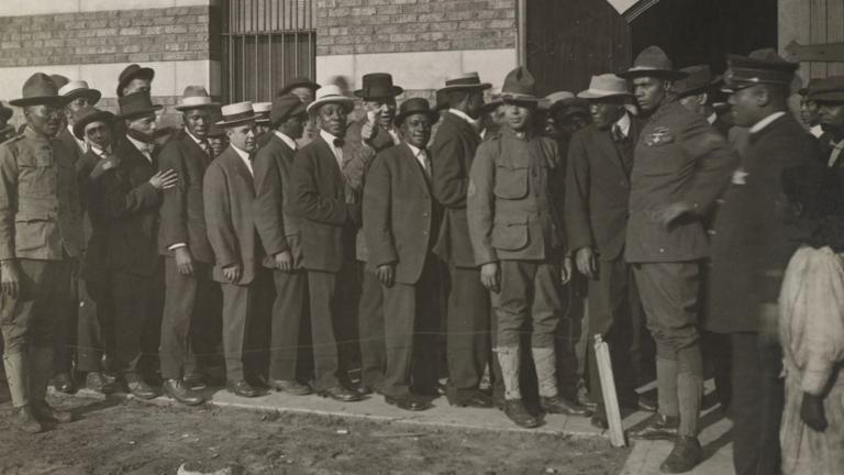 Men line up to enlist in World War I. (Courtesy of Christopher Reed)