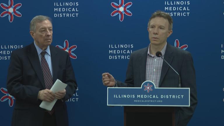University of Chicago researcher Dr. Scott Oakes, right, speaks during a news conference with U.S. Sen. Dick Durbin, left, and other medical researchers on the Near West Side on Feb. 17, 2025. (WTTW News)