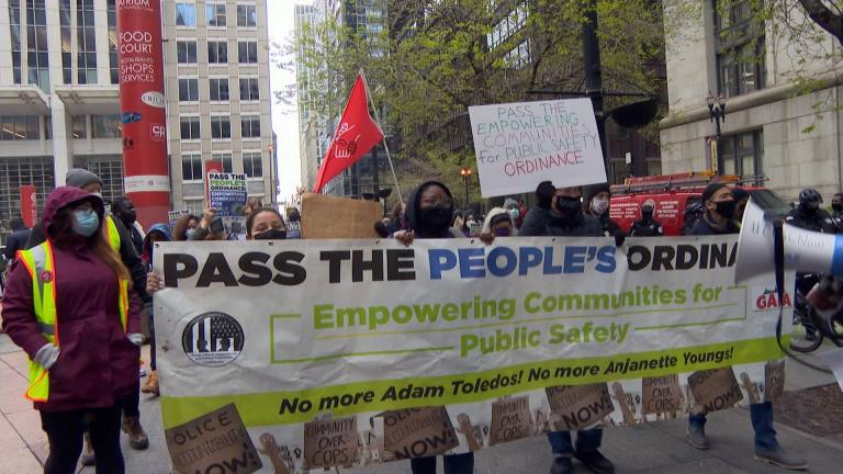 Supporters of the Empowering Communities for Public Safety plan call for more police accountability during a rally April 21, 2021. (WTTW News)