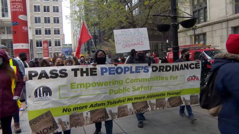 Supporters of the Empowering Communities for Public Safety plan call for more police accountability during a rally April 21, 2021. (WTTW News)