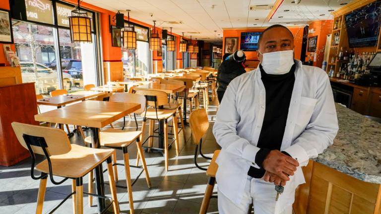Andrew Walcott, owner of Fusion East Caribbean & Soul Food restaurant, poses for a photo at the restaurant in East New York neighborhood of the Brooklyn borough of New York, Thursday, Jan. 7, 2021. Walcott had to furlough four employees at his restaurant just before Christmas, after New York state stopped allowing indoor dining. (AP Photo / Mary Altaffer) Andrew Walcott, owner of Fusion East Caribbean & Soul Food restaurant, poses for a photo at the restaurant in East New York neighborhood of the Brooklyn borough of New York, Thursday, Jan. 7, 2021. Walcott had to furlough four employees at his restaurant just before Christmas, after New York state stopped allowing indoor dining. (AP Photo / Mary Altaffer)