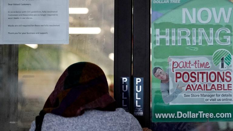 A shopper enters a retail store as a hiring sign shows in Buffalo Grove, Ill., Thursday, June 24, 2021. (AP Photo / Nam Y. Huh) A shopper enters a retail store as a hiring sign shows in Buffalo Grove, Ill., Thursday, June 24, 2021. (AP Photo / Nam Y. Huh)