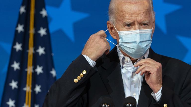 Democratic presidential candidate former Vice President Joe Biden removes his face mask to speak at The Queen theater, Thursday, Nov. 5, 2020, in Wilmington, Del. (AP Photo / Carolyn Kaster)