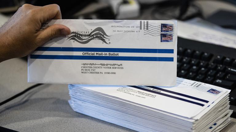 In this May 28, 2020, file photo, mail-in ballots are processed at the Chester County Voter Services office in West Chester, Pa., prior to the primary election. (AP Photo / Matt Rourke, File)