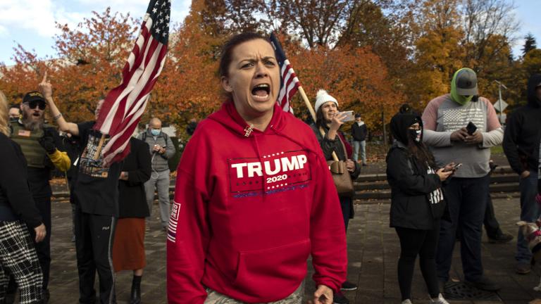 A supporter of President Donald Trump reacts during a rally to protest against President-elect Joe Biden's win at the state capitol on Saturday Nov. 7, 2020 in Salem, Ore. (AP Photo / Paula Bronstein)