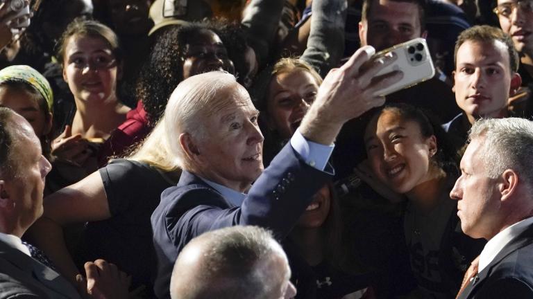 President Joe Biden takes a photo with people in the crowd after speaking at a campaign event for New York Gov. Kathy Hochul, Sunday, Nov. 6, 2022, at Sarah Lawrence College in Yonkers, N.Y. (AP Photo/Patrick Semansky)