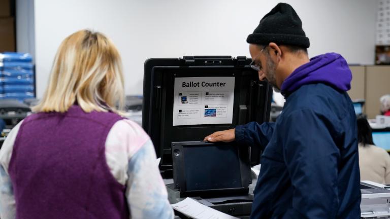 Election judges demonstrate the accuracy of the city’s voting equipment on Oct. 28, 2022, in Minneapolis. (AP Photo / Abbie Parr)