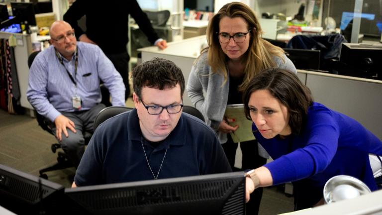 Associated Press Washington Bureau Chief Julie Pace, right, looks over a headline with deputy managing editor for operations David Scott in the newsroom at the Associated Press in Washington, Feb. 5, 2020. (AP Photo / Jenny Kane, File)