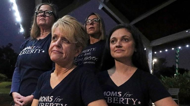 Moms for Liberty members, from left, Cheryl Bryant, Mishelle Minella, Kelly Shilson and Jessica Tillmann pose for a portrait at Reiter Park on Thursday, Nov. 18, 2021, in Longwood, Fla. (Chasity Maynard / Orlando Sentinel via AP, File)