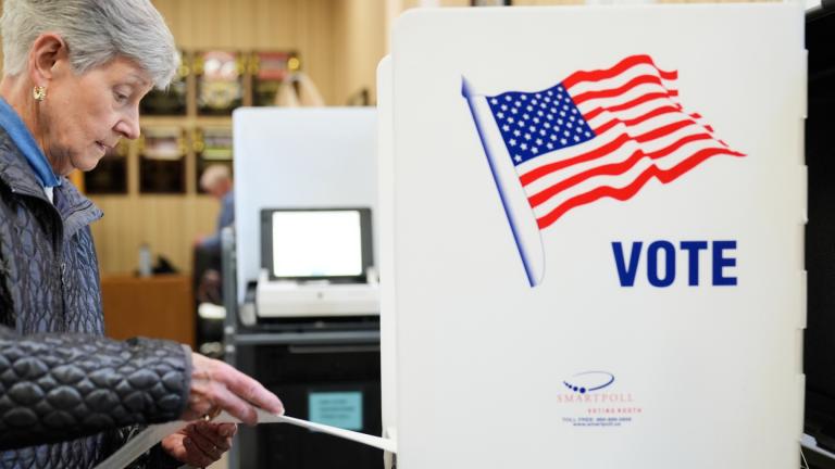 A woman feeds her ballot into a scanning machine at an early voting site in Haverstraw, N.Y., Monday, Oct. 26, 2026. (AP Photo / Seth Wenig)